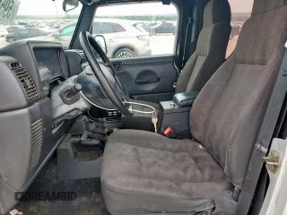 2004 Jeep Wrangler X z VIN 1J4FA39S34P702186, wystawiony jako Copart lot #59561675 z przebiegiem 202 214 mil mil oraz Szkoda całkowita • Salvage title. Historia ofert i sprzedaży dostępna na DreamBid. Obrazek 7.