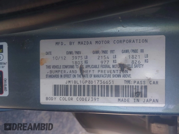 2013 Mazda 3 i Sport z VIN JM1BL1UP8D1736651, wystawiony jako IAAI lot #42263871 z przebiegiem 187 874 mil mil oraz . Historia ofert i sprzedaży dostępna na DreamBid. Obrazek 9.