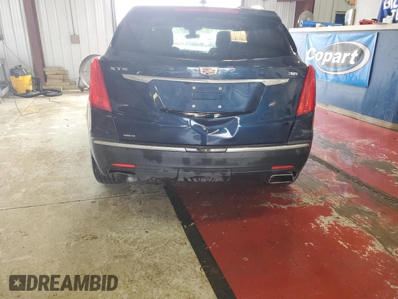 2017 Cadillac XT5 Luxury AWD z VIN 1GYKNDRS9HZ218719, wystawiony jako Copart lot #60915135 z przebiegiem 168 309 mil mil oraz Szkoda całkowita • Salvage title. Historia ofert i sprzedaży dostępna na DreamBid. Obrazek 6.
