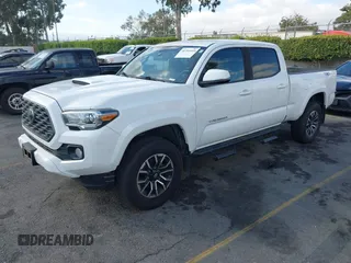 2020 Toyota Tacoma SR5 with VIN 3TMBZ5DN7LM026596, listed as a IAAI auction lot 40705410 with 123,489 mi miles and . Bid and sale history available at DreamBid. Image 18.