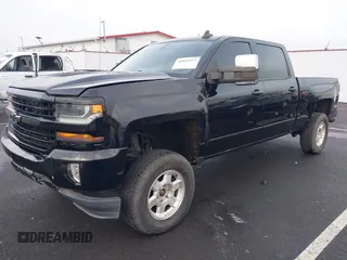 2017 Chevrolet Silverado 1500 LT with VIN 1GCUKREC1HF117744, listed as a IAAI auction lot 41091255 with 61,984 mi miles and . Bid and sale history available at DreamBid. Image 19.