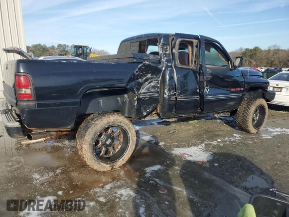 1999 Dodge 1500 with VIN 1B7HF13Z1XJ622564, listed as a Copart auction lot 42615515 with 242,904 mi miles and Salvage title. Bid and sale history available at DreamBid. Image 3.