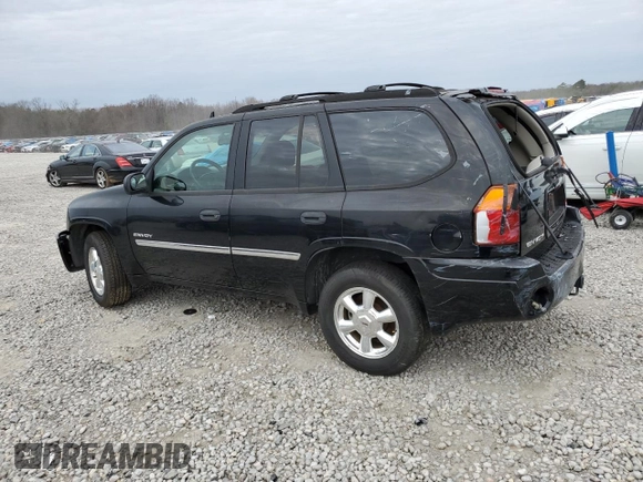 2006 GMC Envoy SLT with VIN 1GKDS13SX62354690, listed as a Copart auction lot 84138814 with 194,669 mi miles and Salvage Title. Bid and sale history available at carsss.com. Image 2.