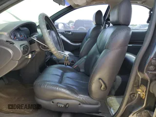 1999 Chrysler Cirrus LXi z VIN 1C3EJ56H4XN640016, wystawiony jako Copart lot #65498464 z przebiegiem 82 149 mil mil oraz Tytuł czysty. Historia ofert i sprzedaży dostępna na DreamBid. Obrazek 7.