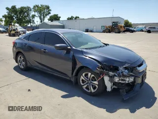 2017 Honda Civic LX z VIN 2HGFC2F55HH523474, wystawiony jako Copart lot #54933425 z przebiegiem 133 036 mil mil oraz Szkoda całkowita • Salvage title. Historia ofert i sprzedaży dostępna na DreamBid. Obrazek 4.