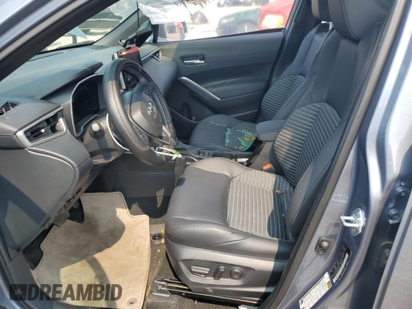 2023 Toyota Corolla Cross Hybrid S with VIN 7MUFBABG6PV014406, listed as a Copart auction lot 59944835 with 8,252 mi miles and Salvage title. Bid and sale history available at DreamBid. Image 7.