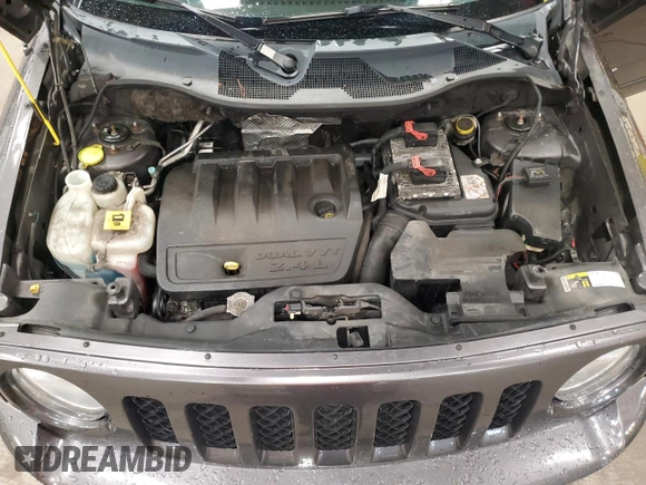 2016 Jeep Patriot High Altitude with VIN 1C4NJRFB5GD697474, listed as a Copart auction lot 57881215 with 152,127 mi miles and Salvage title. Bid and sale history available at DreamBid. Image 12.