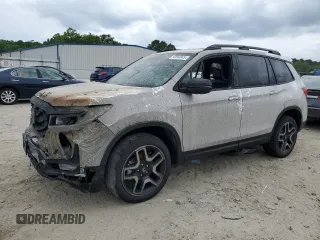 2023 Honda Passport Elite z VIN 5FNYF8H06PB022732, wystawiony jako Copart lot #56893845 z przebiegiem 33 620 mil mil oraz Szkoda całkowita • Salvage title. Historia ofert i sprzedaży dostępna na DreamBid. Obrazek 1.