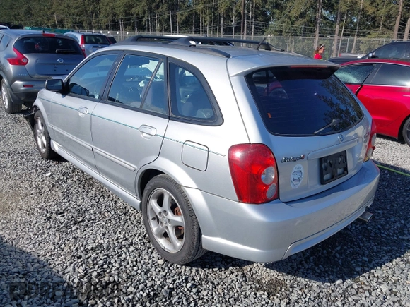 2002 Mazda Protege z VIN JM1BJ246221493337, wystawiony jako IAAI lot #42171966 z przebiegiem 244 609 mil mil oraz . Historia ofert i sprzedaży dostępna na DreamBid. Obrazek 3.