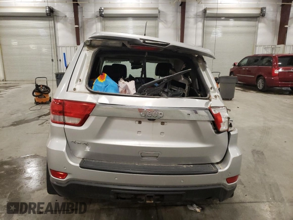 2011 Jeep Grand Cherokee 70th Anniversary with VIN 1J4RR4GG0BC666357, listed as a Copart auction lot 71726674 with 122,802 mi miles and Salvage Title. Bid and sale history available at carsss.com. Image 6.