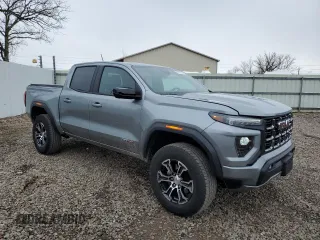 2023 GMC Canyon 4WD AT4 with VIN 1GTP6DEK5P1170230, listed as a Copart auction lot 52767295 with 26,769 mi miles and Salvage Title. Bid and sale history available at carsss.com. Image 4.