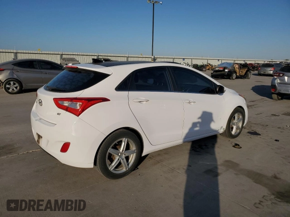 2014 Hyundai Elantra GT with VIN KMHD35LH0EU201836, listed as a Copart auction lot 77316054 with 119,673 mi miles and Clean Title. Bid and sale history available at carsss.com. Image 3.
