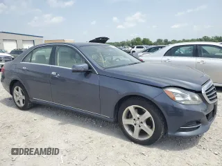 2015 Mercedes-Benz E 350 Luxury with VIN WDDHF8JB5FB165755, listed as a Copart auction lot 56584505 with 102,701 mi miles and Salvage title. Bid and sale history available at DreamBid. Image 4.