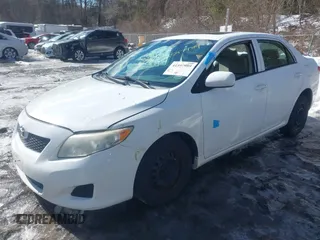 2010 Toyota Corolla with VIN 2T1BU4EE4AC305484, listed as a IAAI auction lot 41597989 with 155,898 mi miles. Bid and sale history available at carsss.com. Image 17.