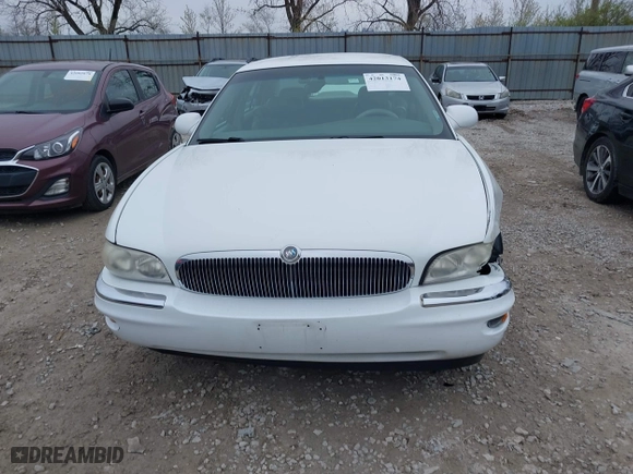 1999 Buick Park Avenue Ultra with VIN 1G4CU5217X4658627, listed as a IAAI auction lot 42013174 with 148,856 mi miles. Bid and sale history available at carsss.com. Image 12.