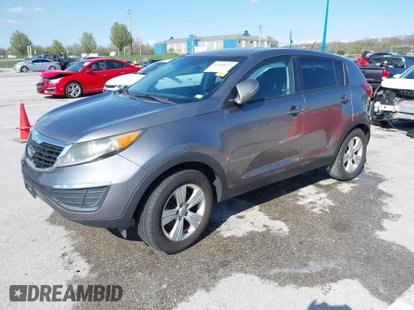 2013 Kia Sportage LX with VIN KNDPB3A24D7365157, listed as a IAAI auction lot 41968652 with 137,055 mi miles and . Bid and sale history available at DreamBid. Image 2.