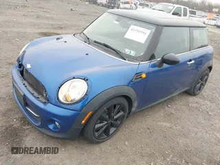 2013 MINI Hardtop with VIN WMWSU3C54DT375008, listed as a IAAI auction lot 41751594 with 136,269 mi miles and . Bid and sale history available at DreamBid. Image 2.