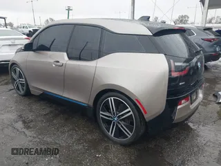 2014 BMW i3 with VIN WBY1Z4C58EV276329, listed as a IAAI auction lot 41570602 with 87,925 mi miles and . Bid and sale history available at DreamBid. Image 3.