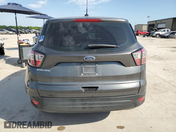2017 Ford Escape S с VIN 1FMCU0F75HUC48671, выставлен на аукционе Copart как лот 56767755 с пробегом 163 853 миль миль и Списание • Salvage title. История ставок и продаж доступна на DreamBid. Изображение 6.