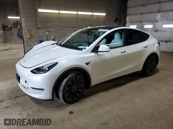 2023 Tesla Model Y Performance z VIN 7SAYGDEF6PF798103, wystawiony jako Copart lot #53607895 z przebiegiem 22 334 mil mil oraz Szkoda całkowita • Salvage title. Historia ofert i sprzedaży dostępna na DreamBid. Obrazek 1.