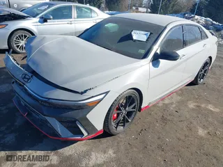2025 Hyundai Elantra N with VIN KMHLW4DK9SU023797, listed as a IAAI auction lot 41433306 with 2,019 mi miles. Bid and sale history available at carsss.com. Image 17.