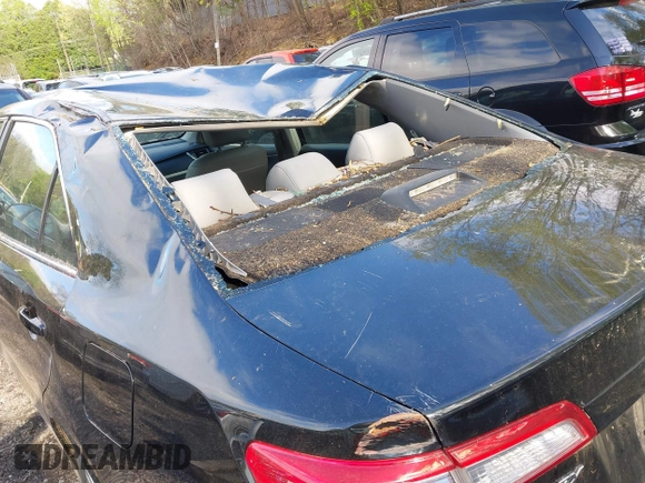 2014 Toyota Camry L with VIN 4T4BF1FK7ER395057, listed as a IAAI auction lot 42215441 with 166,247 mi miles and . Bid and sale history available at DreamBid. Image 12.