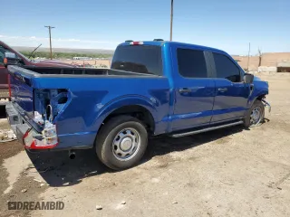 2023 Ford F-150 XL with VIN 1FTEW1CB6PKD83299, listed as a Copart auction lot 67133984 with 14,693 mi miles and Salvage Title. Bid and sale history available at carsss.com. Image 3.