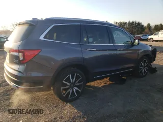 2020 Honda Pilot Touring 8-Passenger with VIN 5FNYF6H92LB031005, listed as a Copart auction lot 49545335 with 59,789 mi miles and Salvage Title. Bid and sale history available at DreamBid. Image 3.