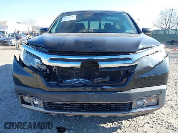 2019 Honda Ridgeline RTL-E with VIN 5FPYK3F7XKB033652, listed as a IAAI auction lot 41751421 with 96,774 mi miles and . Bid and sale history available at DreamBid. Image 6.