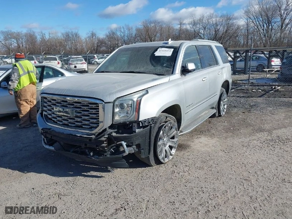 2016 GMC Yukon Denali with VIN 1GKS2CKJ1GR291872, listed as a IAAI auction lot 41169434 with 137,009 mi miles. Bid and sale history available at carsss.com. Image 2.