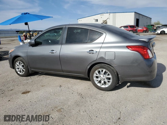 2016 Nissan Versa S Plus with VIN 3N1CN7AP1GL822969, listed as a Copart auction lot 58520635 with 86,889 mi miles and Salvage title. Bid and sale history available at DreamBid. Image 2.