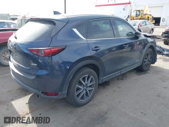 2017 Mazda CX-5 Grand Touring with VIN JM3KFBDL3H0149397, listed as a IAAI auction lot 41085425 with 161,675 mi miles. Bid and sale history available at carsss.com. Image 4.
