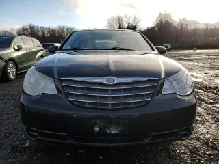2010 Chrysler Sebring Limited with VIN 1C3CC5FB2AN120496, listed as a Copart auction lot 82131024 with 106,563 mi miles and Salvage Title. Bid and sale history available at carsss.com. Image 5.