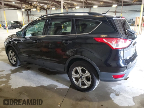 2016 Ford Escape SE with VIN 1FMCU9GX1GUC24692, listed as a Copart auction lot 88102815 with 114,900 mi miles and Salvage Title. Bid and sale history available at DreamBid. Image 2.