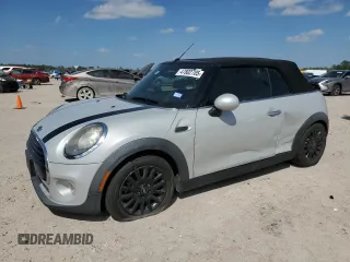 2016 MINI Convertible with VIN WMWWG5C51G3C19570, listed as a Copart auction lot 47802705 with 92,492 mi miles and Salvage Title. Bid and sale history available at DreamBid. Image 1.