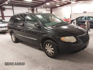 2007 Chrysler Town & Country Touring z VIN 2A4GP54L87R136852, wystawiony jako IAAI lot #40909811 z przebiegiem 140 383 mil mil oraz . Historia ofert i sprzedaży dostępna na DreamBid. Obrazek 1.