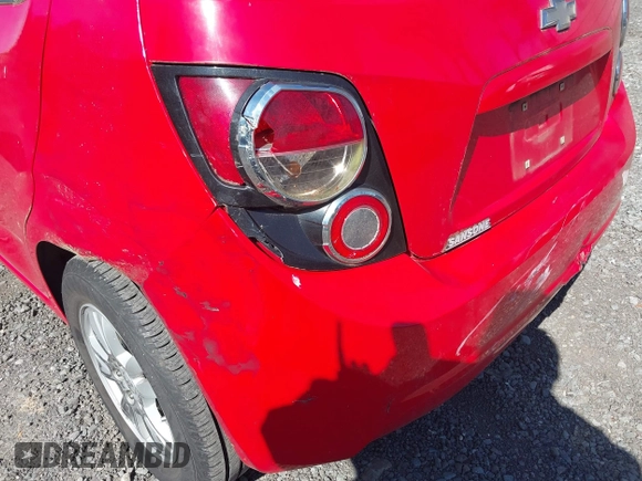 2014 Chevrolet Sonic LT with VIN 1G1JC6SG1E4129835, listed as a IAAI auction lot 42080133 with 94,170 mi miles. Bid and sale history available at carsss.com. Image 6.