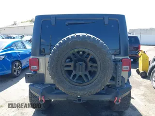 2017 Jeep Wrangler Unlimited Sahara with VIN 1C4BJWEG1HL746854, listed as a IAAI auction lot 41948127 with 97,730 mi miles. Bid and sale history available at carsss.com. Image 16.
