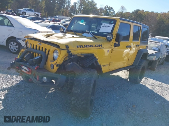 2015 Jeep Wrangler Unlimited Rubicon z VIN 1C4BJWFG4FL681946, wystawiony jako IAAI lot #40809597 z przebiegiem 57 148 mil mil oraz . Historia ofert i sprzedaży dostępna na DreamBid. Obrazek 17.