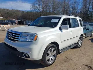 2015 Honda Pilot Touring with VIN 5FNYF3H97FB023842, listed as a IAAI auction lot 41673881 with 106,110 mi miles. Bid and sale history available at carsss.com. Image 19.