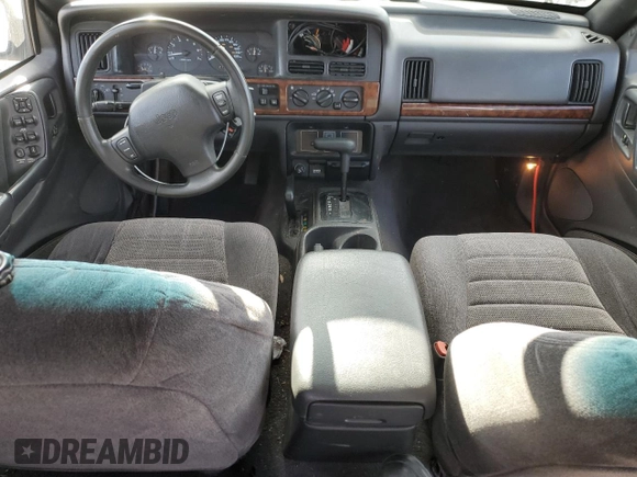 1998 Jeep Grand Cherokee Laredo with VIN 1J4GZ58S7WC316522, listed as a Copart auction lot 80201994 with 217,465 mi miles and Clean Title. Bid and sale history available at carsss.com. Image 8.
