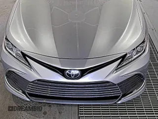 2023 Toyota Camry LE z VIN 4T1C11AK7PU768721, wystawiony jako IAAI lot #42501122 z przebiegiem 82 884 mil mil oraz . Historia ofert i sprzedaży dostępna na DreamBid. Obrazek 1.