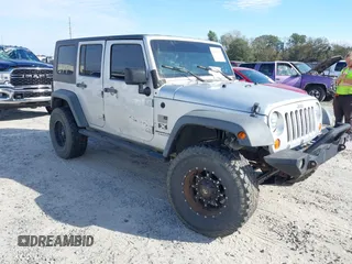 2007 Jeep Wrangler Unlimited X with VIN 1J4GB39147L199367, listed as a IAAI auction lot 40897772 with 229,309 mi miles and . Bid and sale history available at DreamBid. Image 1.