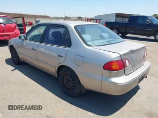 1998 Toyota Corolla VE with VIN 1NXBR18E8WZ105435, listed as a IAAI auction lot 42660562 with 295,050 mi miles and . Bid and sale history available at DreamBid. Image 3.