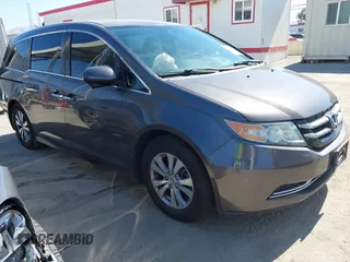 2016 Honda Odyssey EX-L z VIN 5FNRL5H65GB148290, wystawiony jako IAAI lot #42325264 z przebiegiem 157 987 mil mil oraz . Historia ofert i sprzedaży dostępna na DreamBid. Obrazek 1.