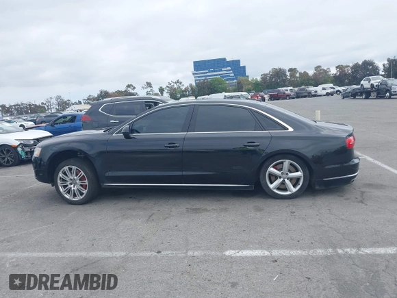 2015 Audi A8 L 4.0T with VIN WAU32AFD4FN033471, listed as a IAAI auction lot 42120112 with 174,882 mi miles. Bid and sale history available at carsss.com. Image 14.