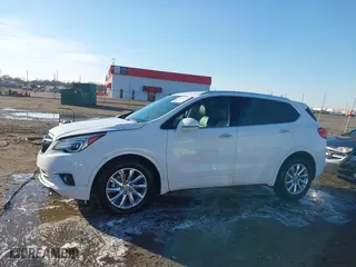 2020 Buick Envision Essence with VIN LRBFXCSA0LD051426, listed as a IAAI auction lot 41132973 with 60,439 mi miles. Bid and sale history available at carsss.com. Image 14.
