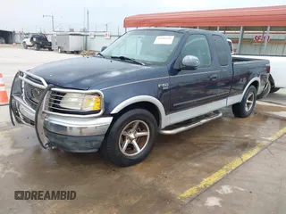 2000 Ford F-150 XL with VIN 1FTRX17L0YKA68579, listed as a IAAI auction lot 41941226 with 1 mi miles. Bid and sale history available at carsss.com. Image 2.