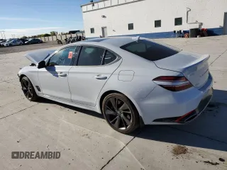 2022 Genesis G70 3.3T with VIN KMTG54TE0NU084403, listed as a Copart auction lot 79113114 with 19,173 mi miles and Salvage Title. Bid and sale history available at DreamBid. Image 2.