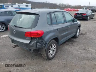 2017 Volkswagen Tiguan S with VIN WVGBV7AX9HK049420, listed as a IAAI auction lot 41838301 with 118,490 mi miles and . Bid and sale history available at DreamBid. Image 4.